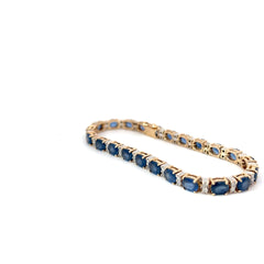 14k Two Tone 10.00ct Oval Blue Sapphire and .50ct G SI1 Round Diamond Bracelet