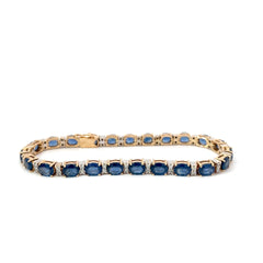 14k Two Tone 10.00ct Oval Blue Sapphire and .50ct G SI1 Round Diamond Bracelet