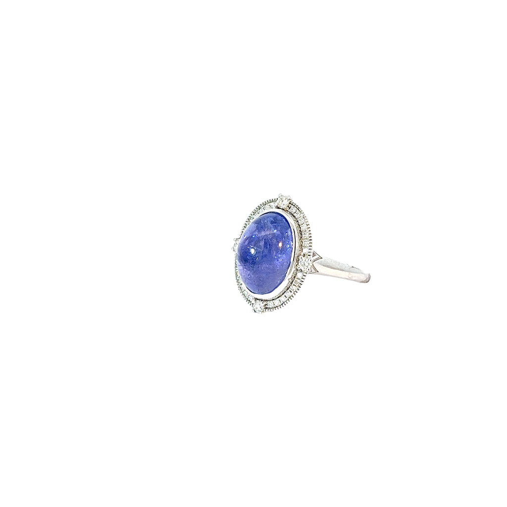 14k White Gold 9.74ct Oval Shape Tanzanite and .36ct G VS2 Round Diamond Ring