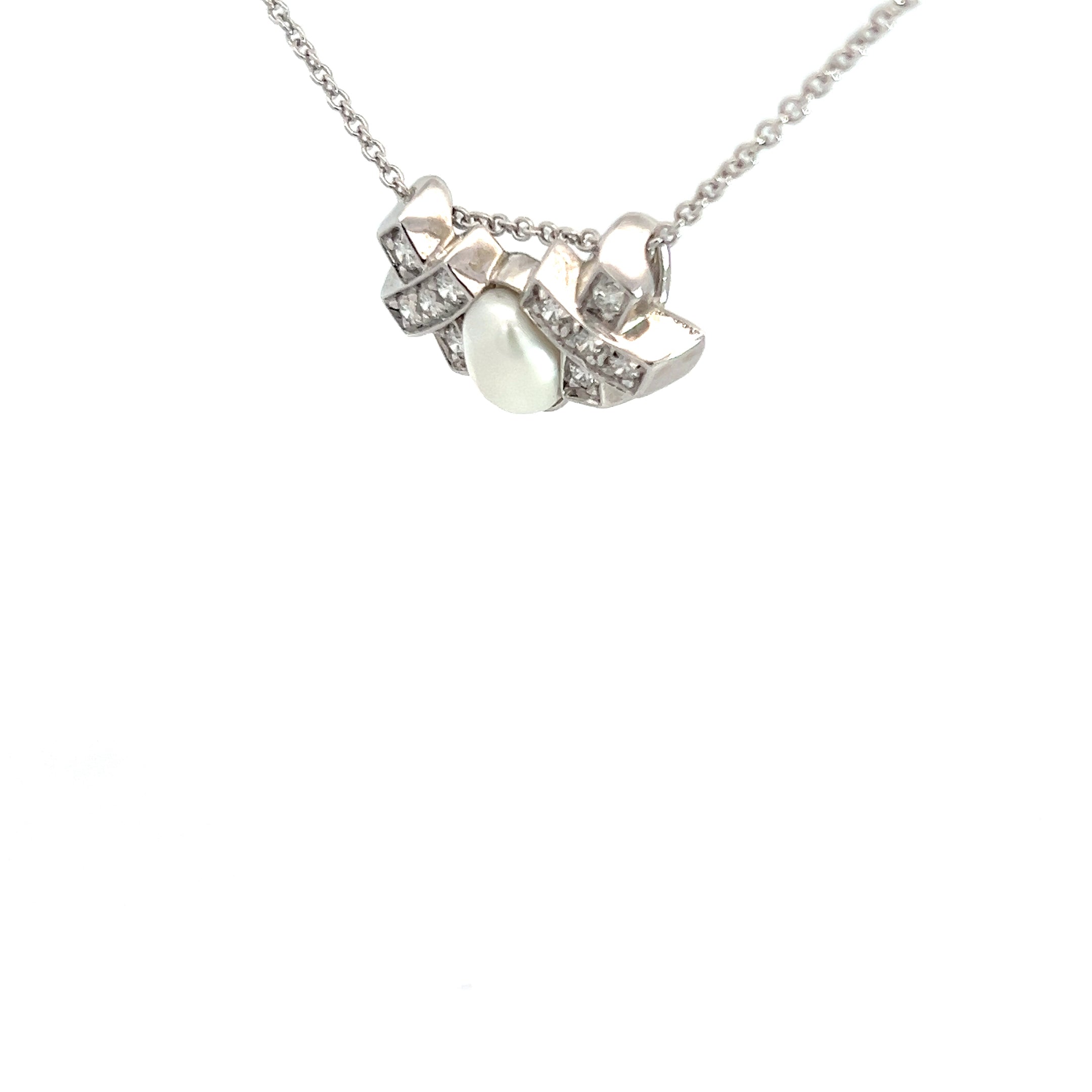 14k White Gold F VS2 Round Diamond with One Pearl XO Pendant