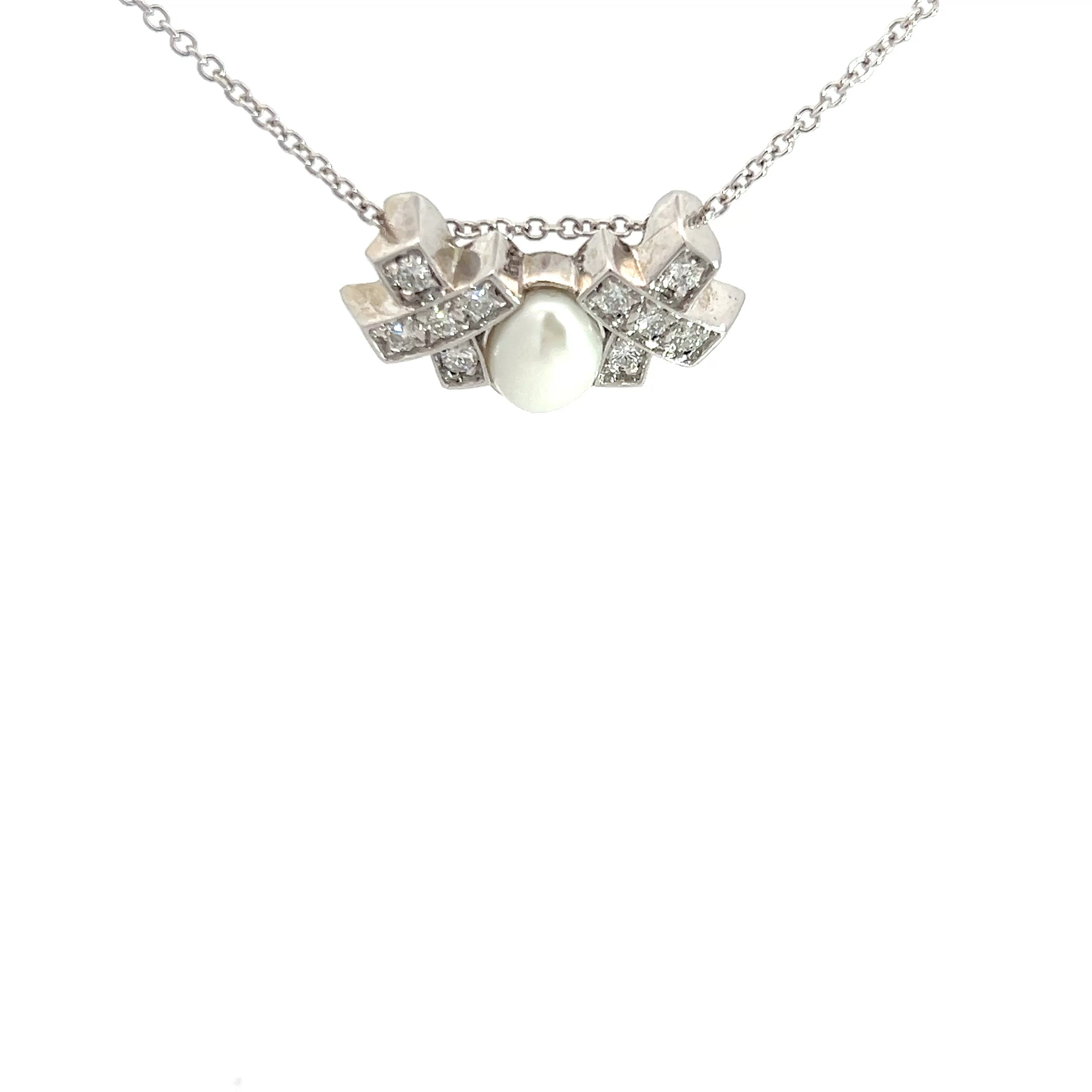 14k White Gold F VS2 Round Diamond with One Pearl XO Pendant