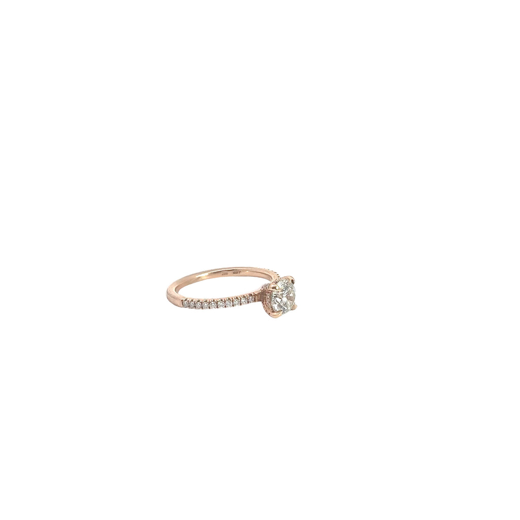 14k Rose Gold 1.01ct  J SI2 Round Diamond Center Stone and .25ct G VS2 Round Diamond along the sides of the engagement Ring. Certified by IGI #375936977