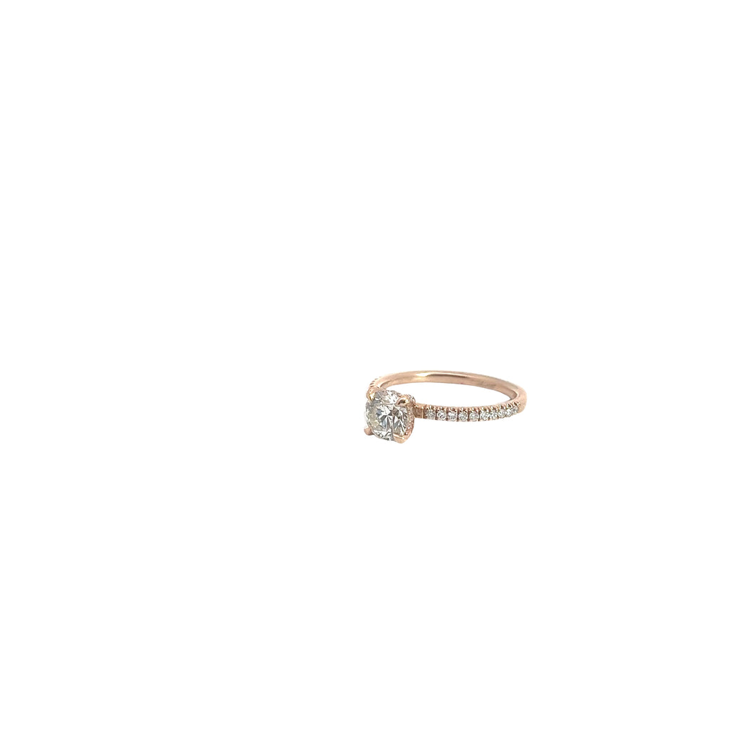 14k Rose Gold 1.01ct  J SI2 Round Diamond Center Stone and .25ct G VS2 Round Diamond along the sides of the engagement Ring. Certified by IGI #375936977