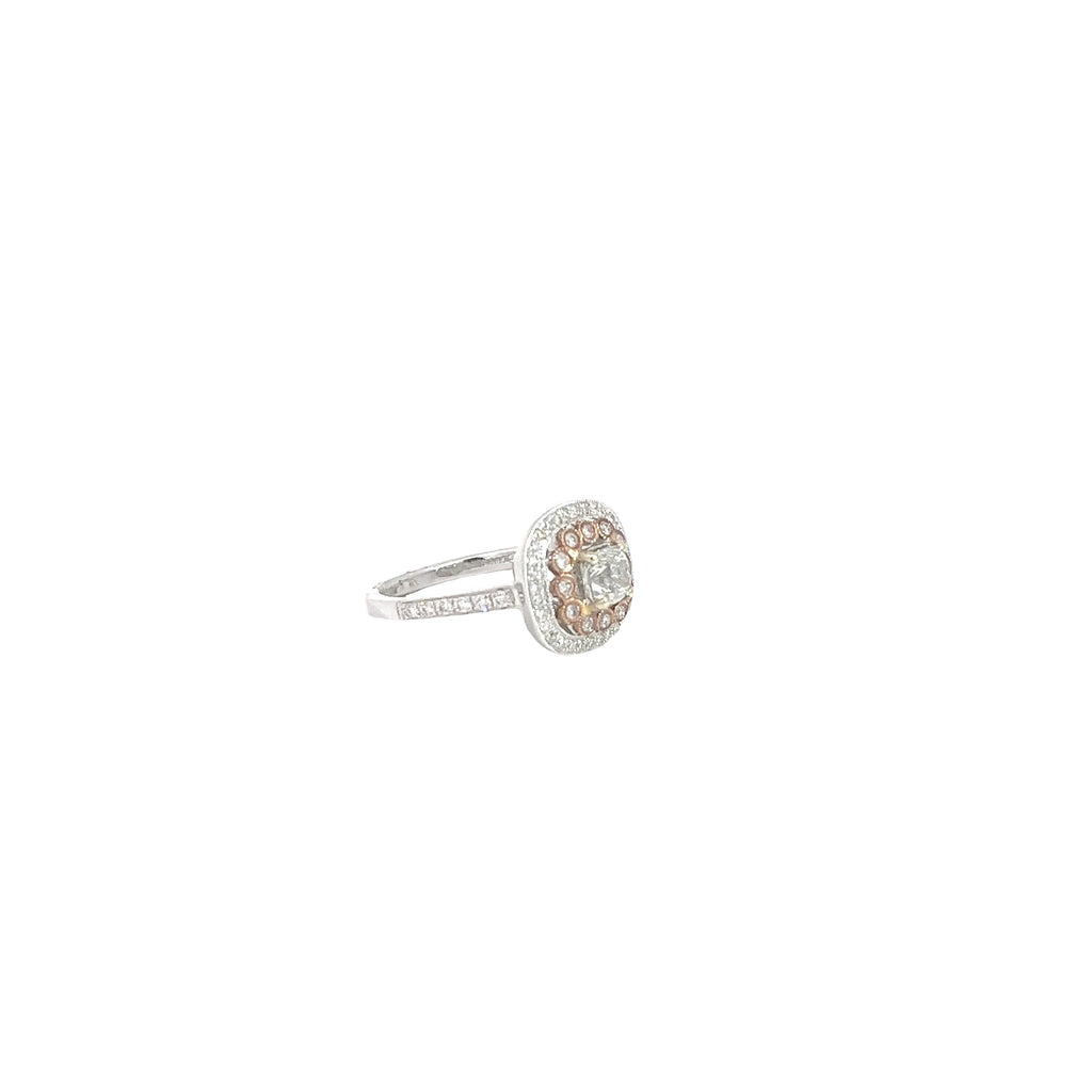 18k White and Rose gold.70ct G SI1 Radiant Diamond and surround by .42ct G SI1 Round Diamond around the Halo and along the band total weight Engagement Ring Size 6 1/2