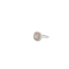 18k White and Rose gold.70ct G SI1 Radiant Diamond and surround by .42ct G SI1 Round Diamond around the Halo and along the band total weight Engagement Ring