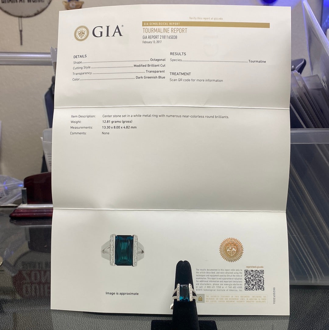 Platinum 4.82ct Octagonal Dark Greenish Blue Tourmaline and Surround by .25ct F VS2 Round Diamond ring Certified by GIA #2181165038