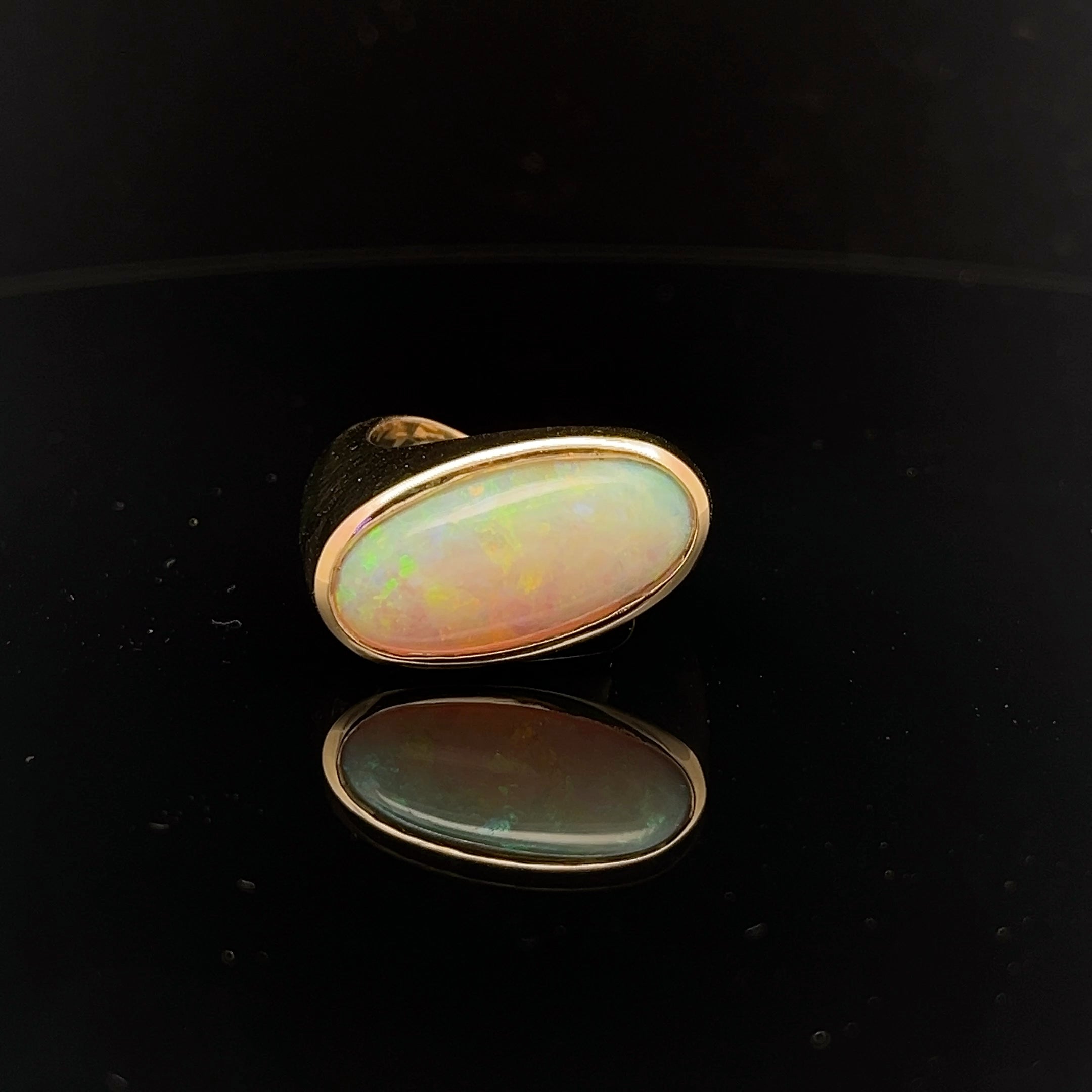 18K YELLOW GOLD 5.35 OVAL OPAL SIDEWAY SET RING