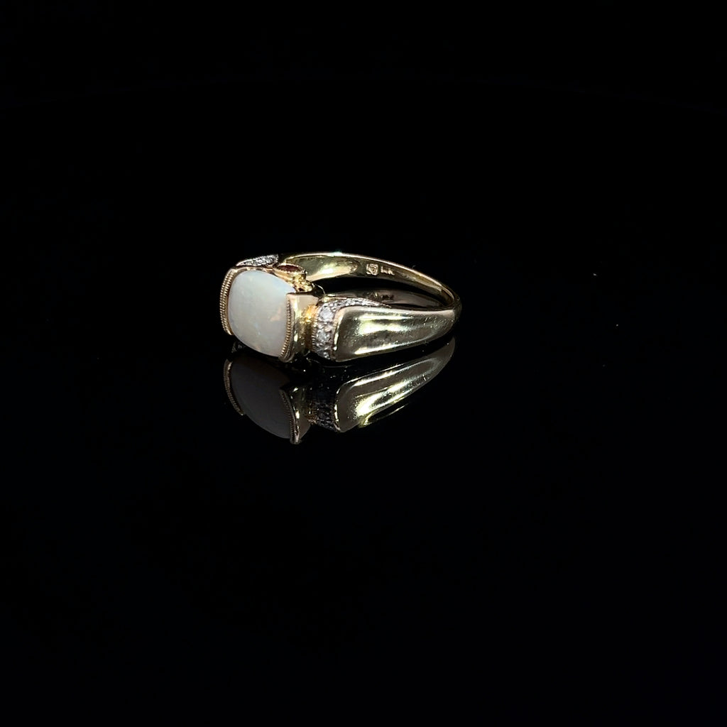 14k Yellow Gold 2.00ct Oval Opal/ .12ct Round Diamond and .10ct Round Rhodolite Garnet Ring
