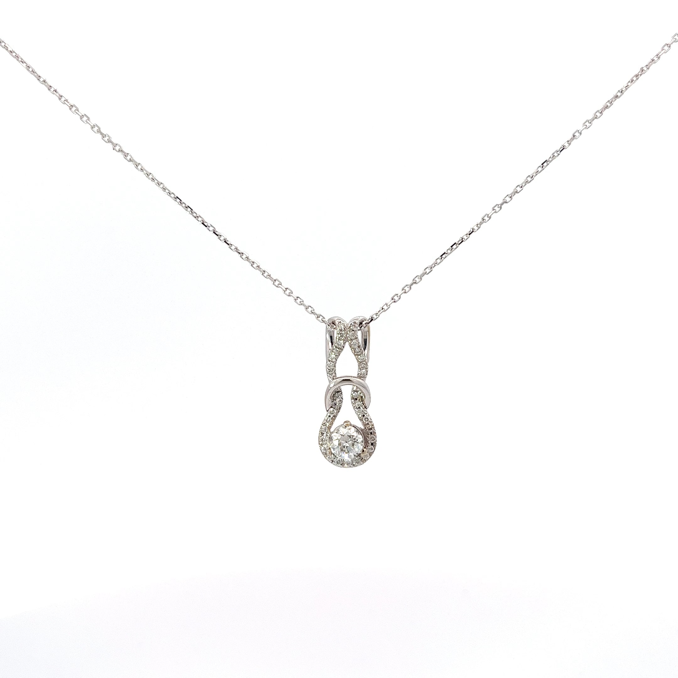14k White Gold .42ct F SI1 Round Diamond along the side/ .20ct Round Diamond Love Knot Necklace