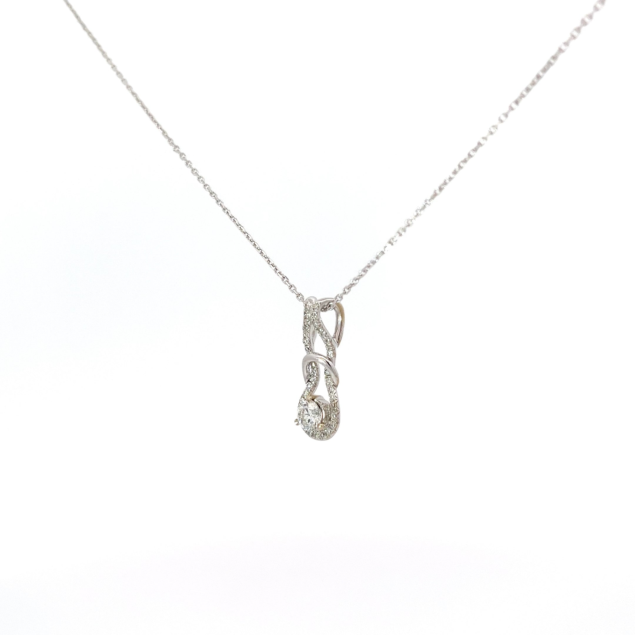 14k White Gold .42ct F SI1 Round Diamond along the side/ .20ct Round Diamond Love Knot Necklace