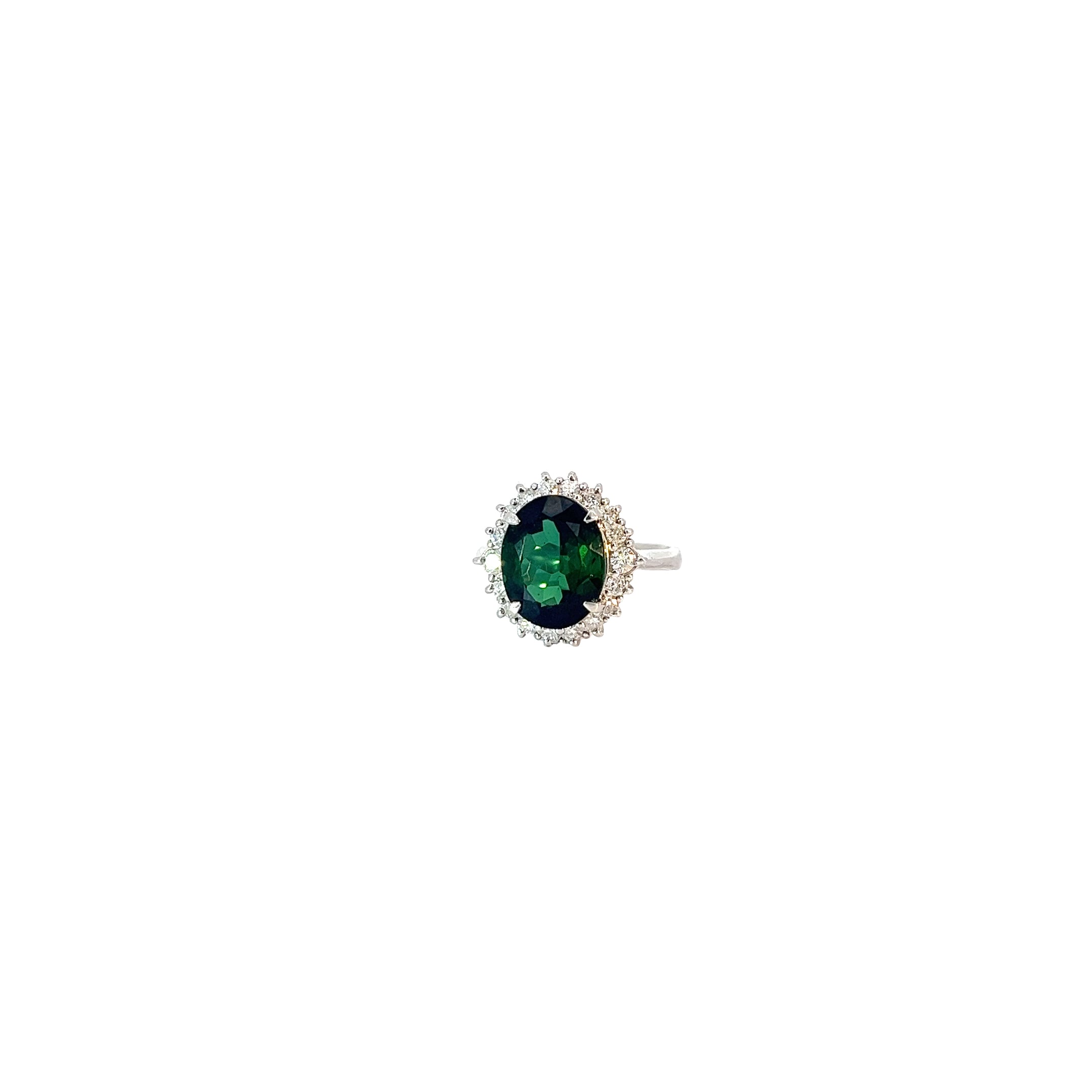 Platinum 4.04ct Oval  AAA Green Tourmaline and surround by the halo .50ct G SI1 Round Diamond ring