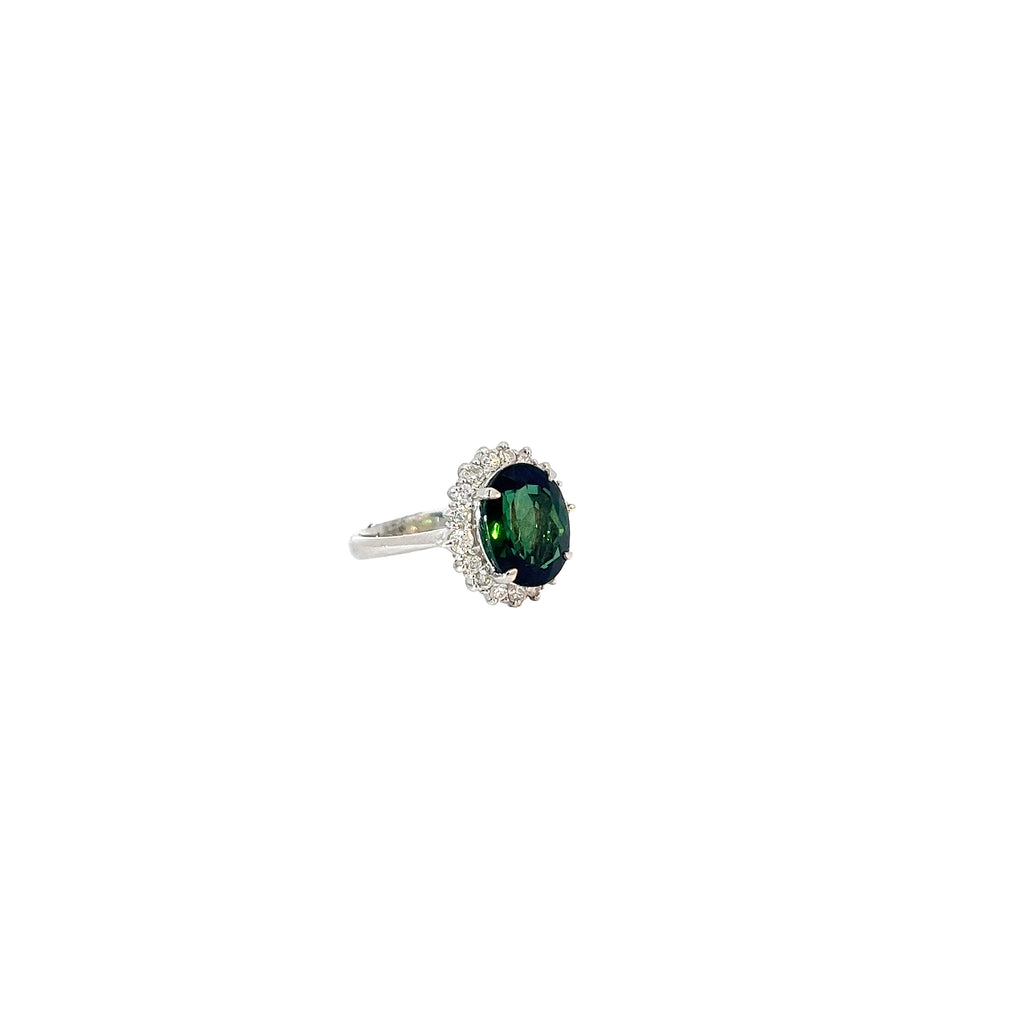 Platinum 4.04ct Oval  AAA Green Tourmaline and surround by the halo .50ct G SI1 Round Diamond ring