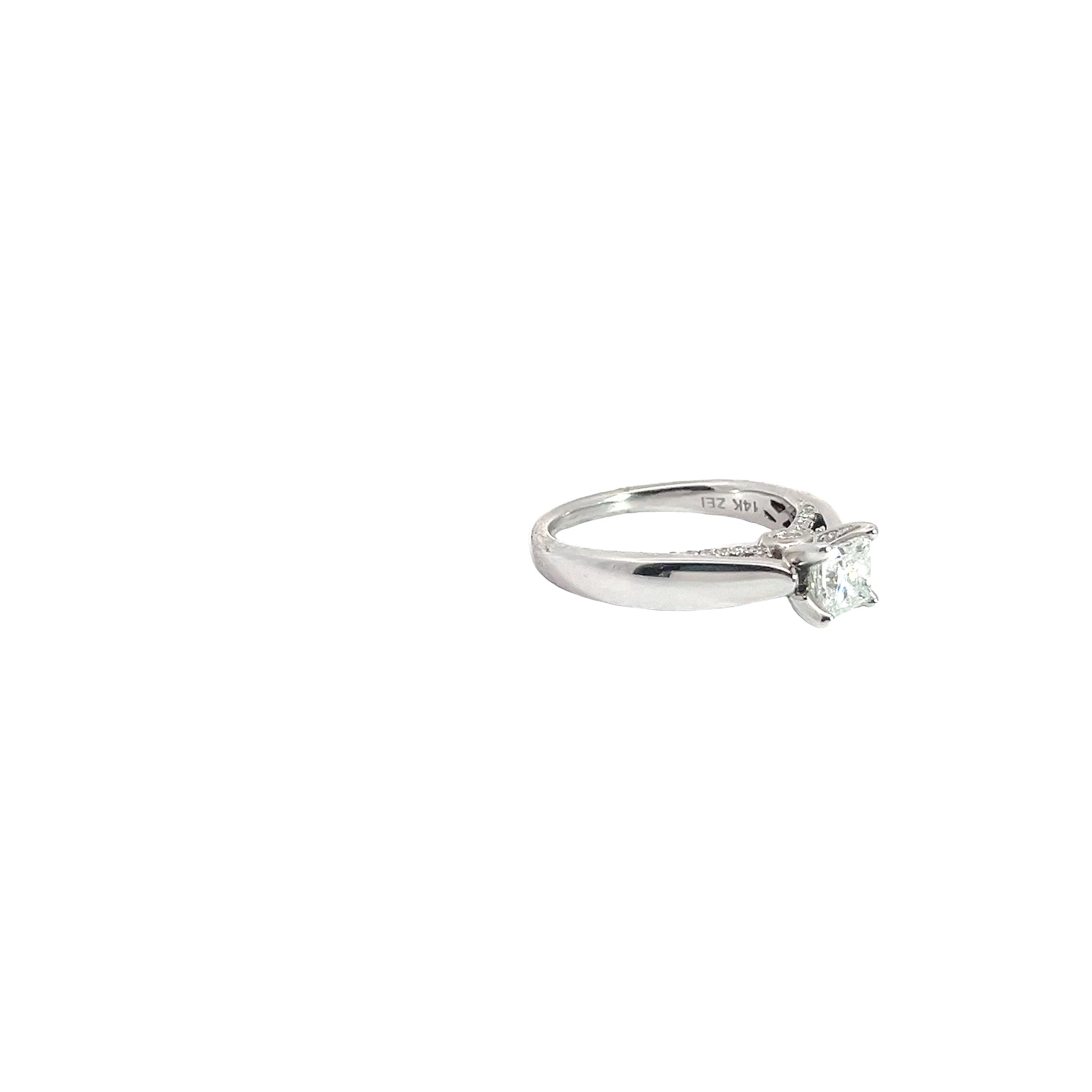 14k white gold 1.00ct G SI1 Princess Cut Diamond and .15ct G SI1 Round diamond under basket mounting engagement ring