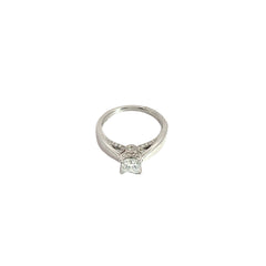 14k white gold 1.00ct G SI1 Princess Cut Diamond and .15ct G SI1 Round diamond under basket mounting engagement ring