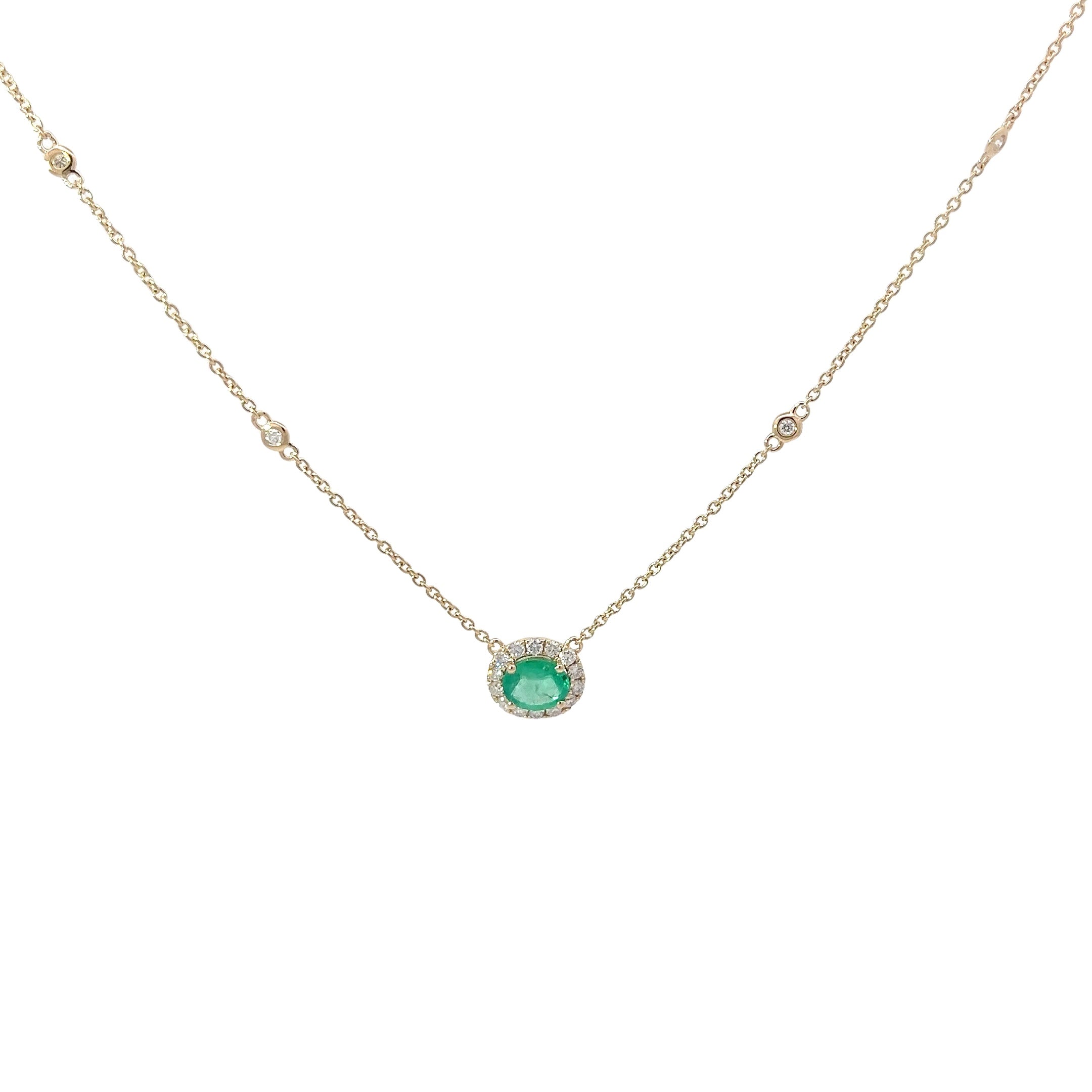 14k Yellow Gold .51ct Colombian Emerald Oval Shape and along Halo .23ct F VS1 Round Diamond Necklace