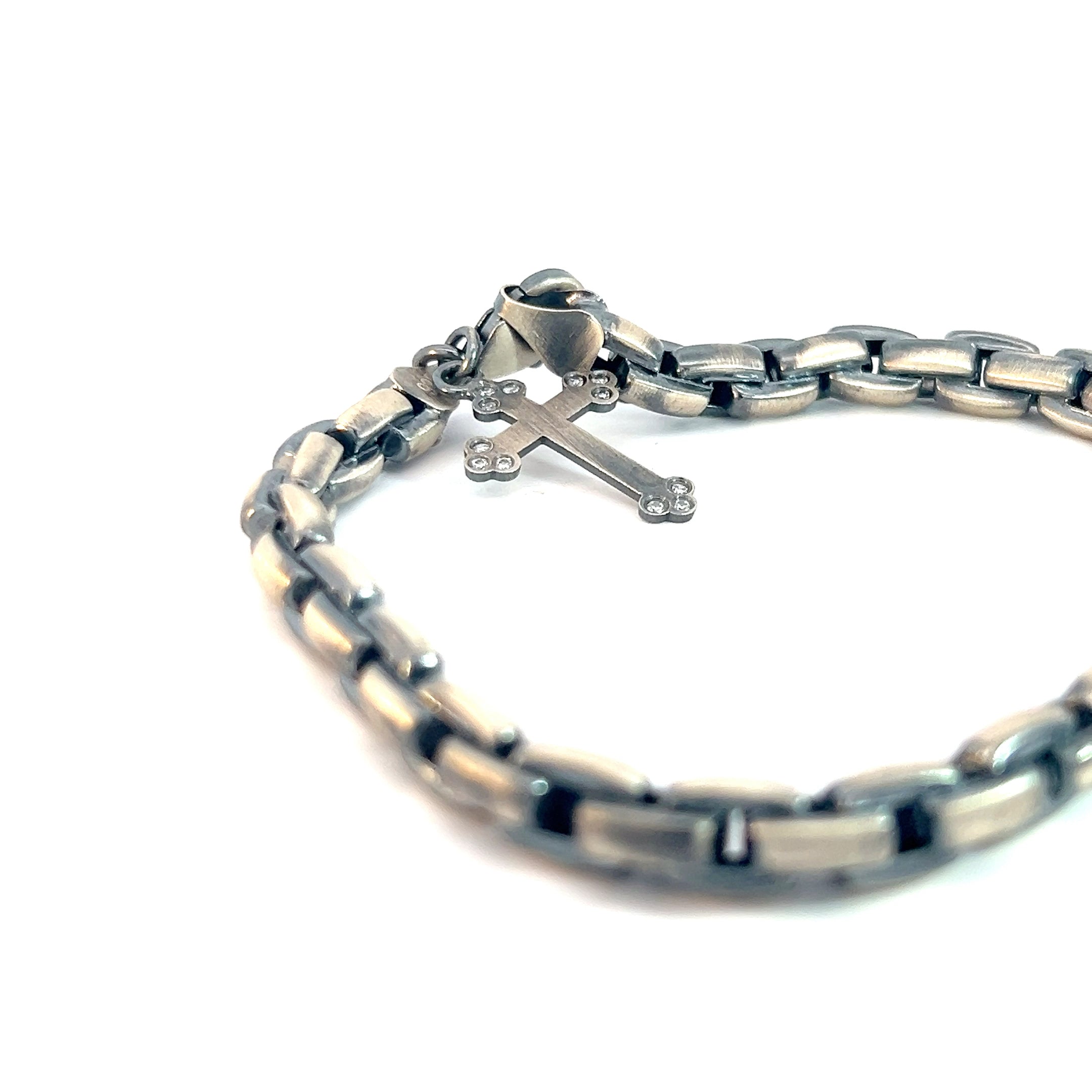 Sterling Silver 10.9 Gram Antiqued Men Bracelet with a Dangle Cross with Cubic Zirconium