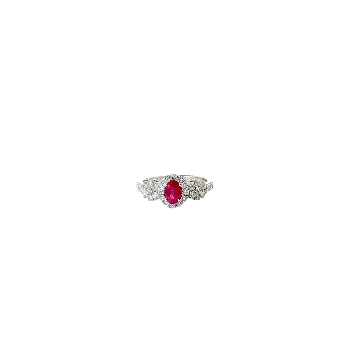 18k white Gold .55ct Oval AA Ruby and along the band .66ct G VS2 Round Diamond ring