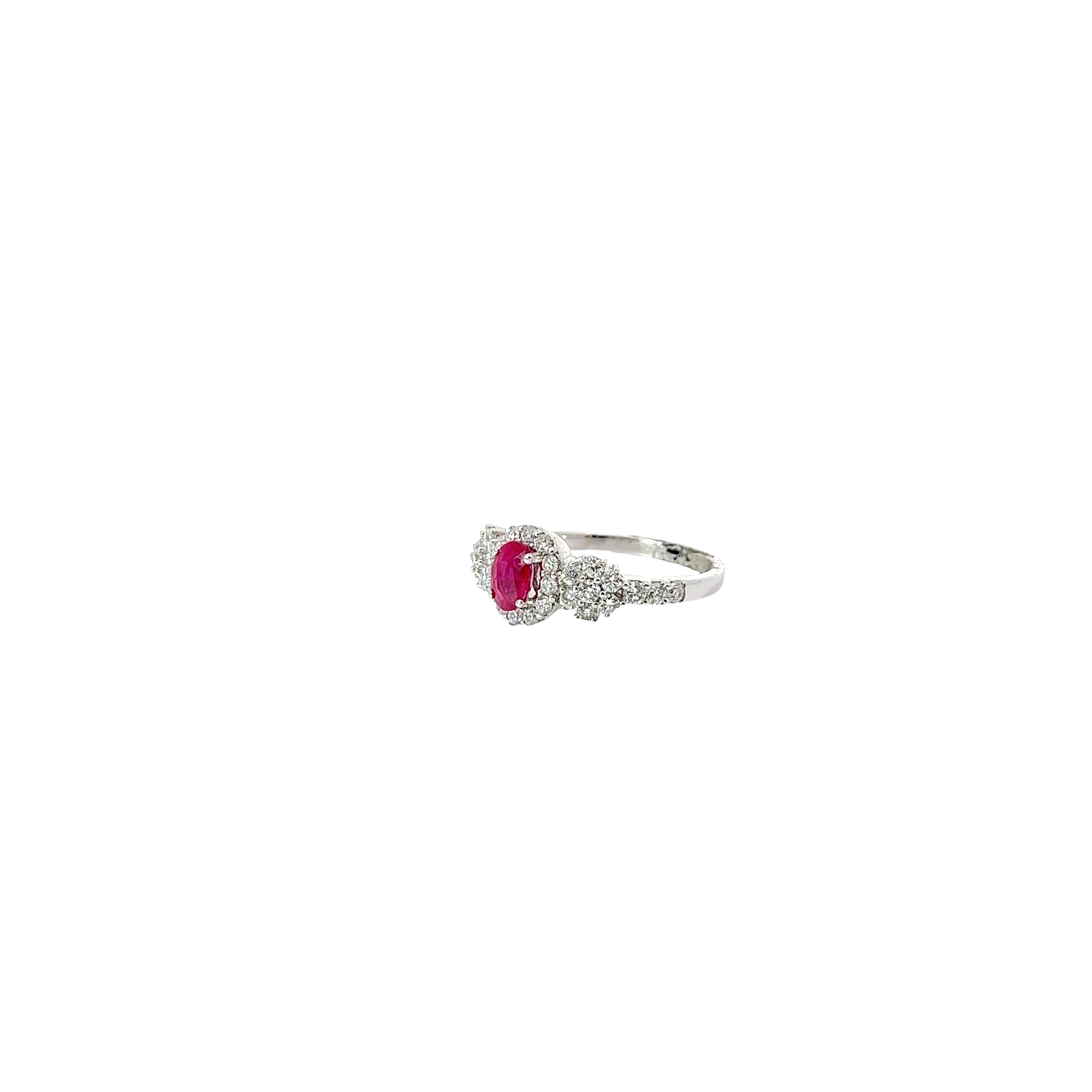 18k White Gold .55ct Oval AA Ruby and along the Band .66ct G VS2 Round Diamond Ring