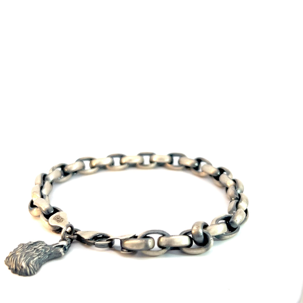 Sterling Silver 29.99 Gram Antiqued Men Bracelet with a Dangle Wolf Head