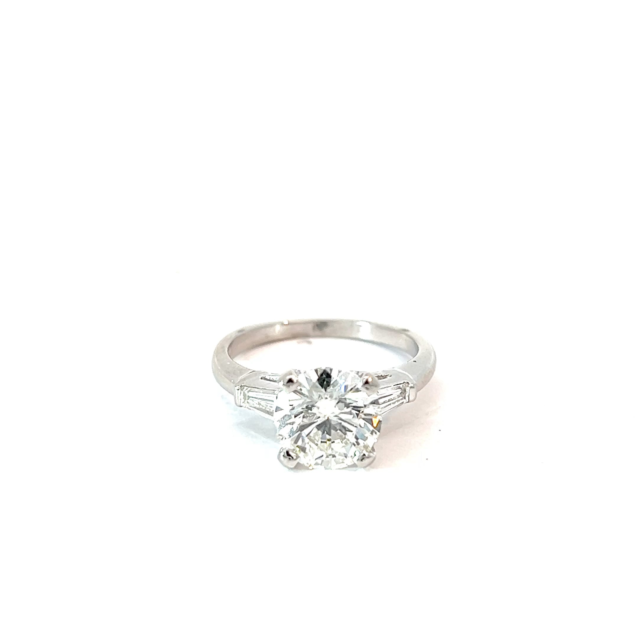 Platinum 3.05 J I1 Round Diamond /.45ct E VS1 Tapered Baguette Diamond (3) Stone Engagement Ring Certified By GIA# 5232651827