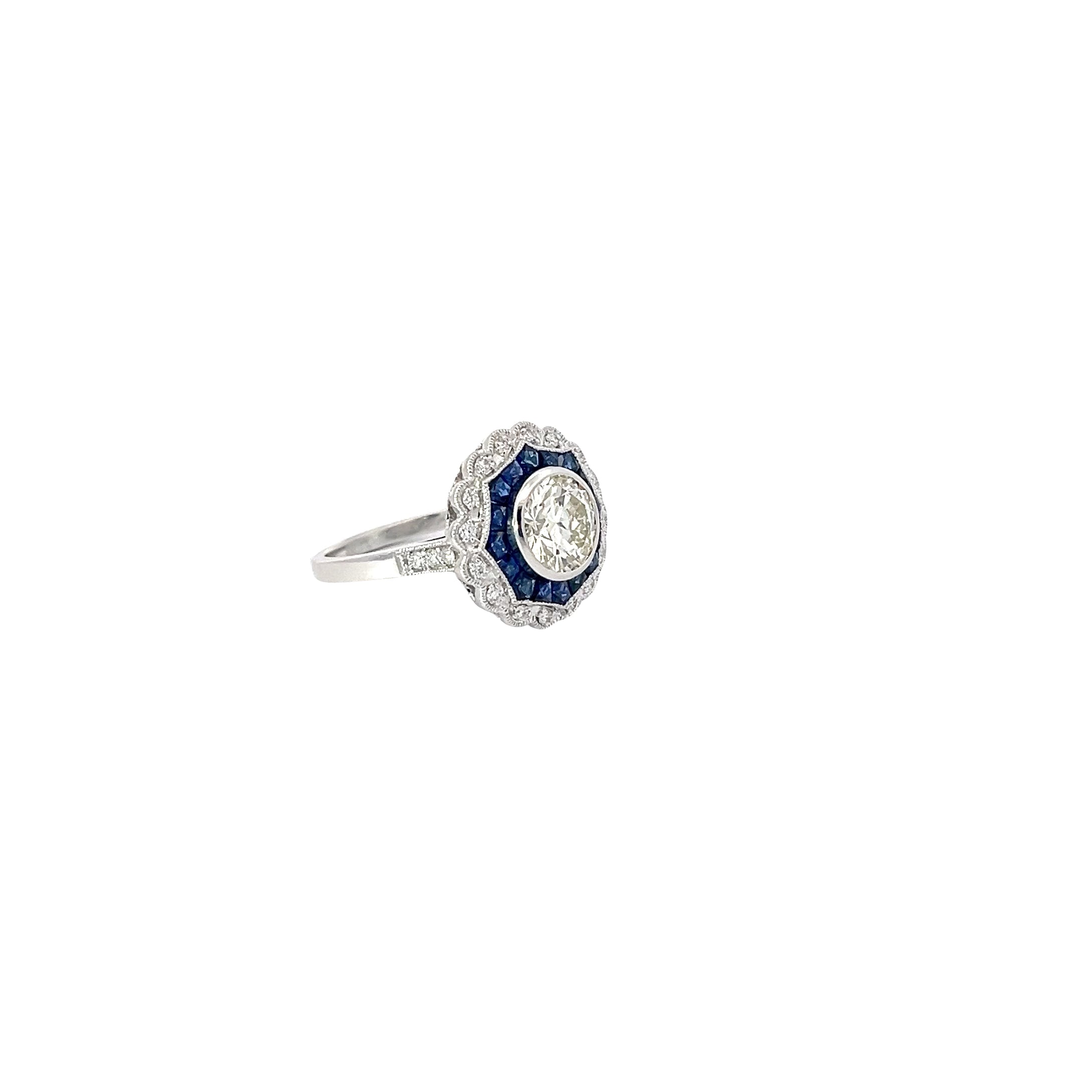 18K WHITE GOLD 1.41CT M VS2 ROUND CENTER DIAMOND AND 1.00CT BLUE SAPPHIRE ON THE HALO /.20CT DIAMOND FOR 1.50CT ROUND DIAMOND ON THE HALO 9.02MM