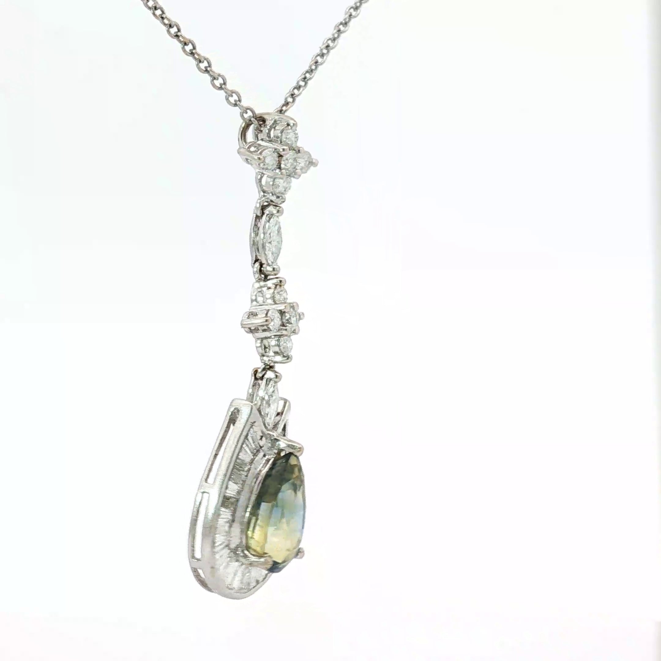 18k White Gold 4.54ct Zoned Blue and Yellow Pear Shape Sapphire Sri Lanka Surround By Baguette Channel Set Halo with Marquise and Round Diamond F VS2 Pendant Necklace Certified By GIA # 2235650287