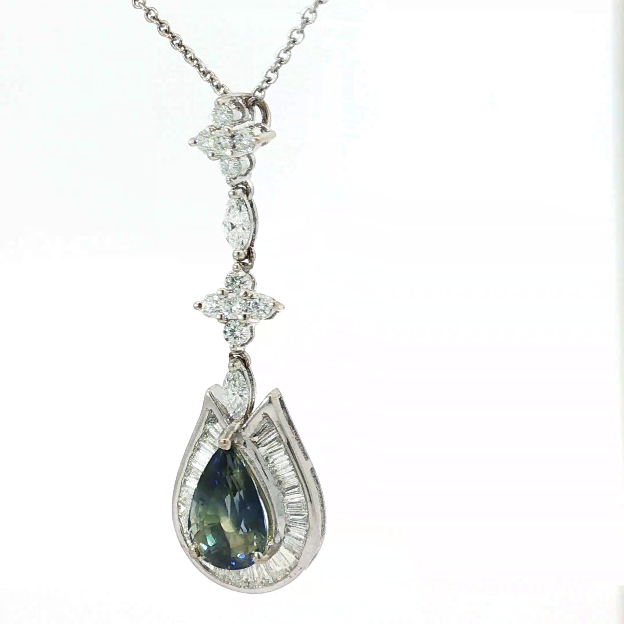 18k White Gold 4.54ct Zoned Blue and Yellow Pear Shape Sapphire Sri Lanka Surround By Baguette Channel Set Halo with Marquise and Round Diamond F VS2 Pendant Necklace Certified By GIA # 2235650287