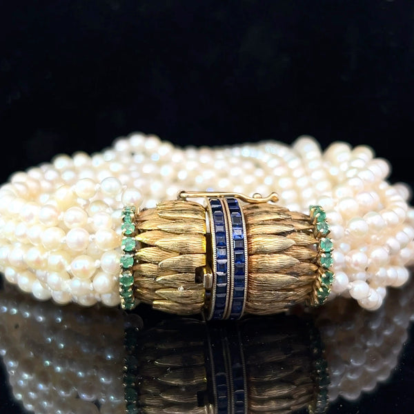 18k Yellow Gold 16 Strand Vintage Pearl Bracelet with Magnificent Chanel Setting in Princess Cut Blue Sapphire and Round Colombian Emerald Feather Inspired Lock Natural Japanese Pearl Bracelet 74.2 gram