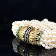 18k Yellow Gold 16 Strand Vintage Pearl Bracelet with Magnificent Chanel Setting in Princess Cut  Blue Sapphire and Round Colombian Emerald Feather Inspired Lock Natural Japanese Pearl Bracelet 74.2 Gram