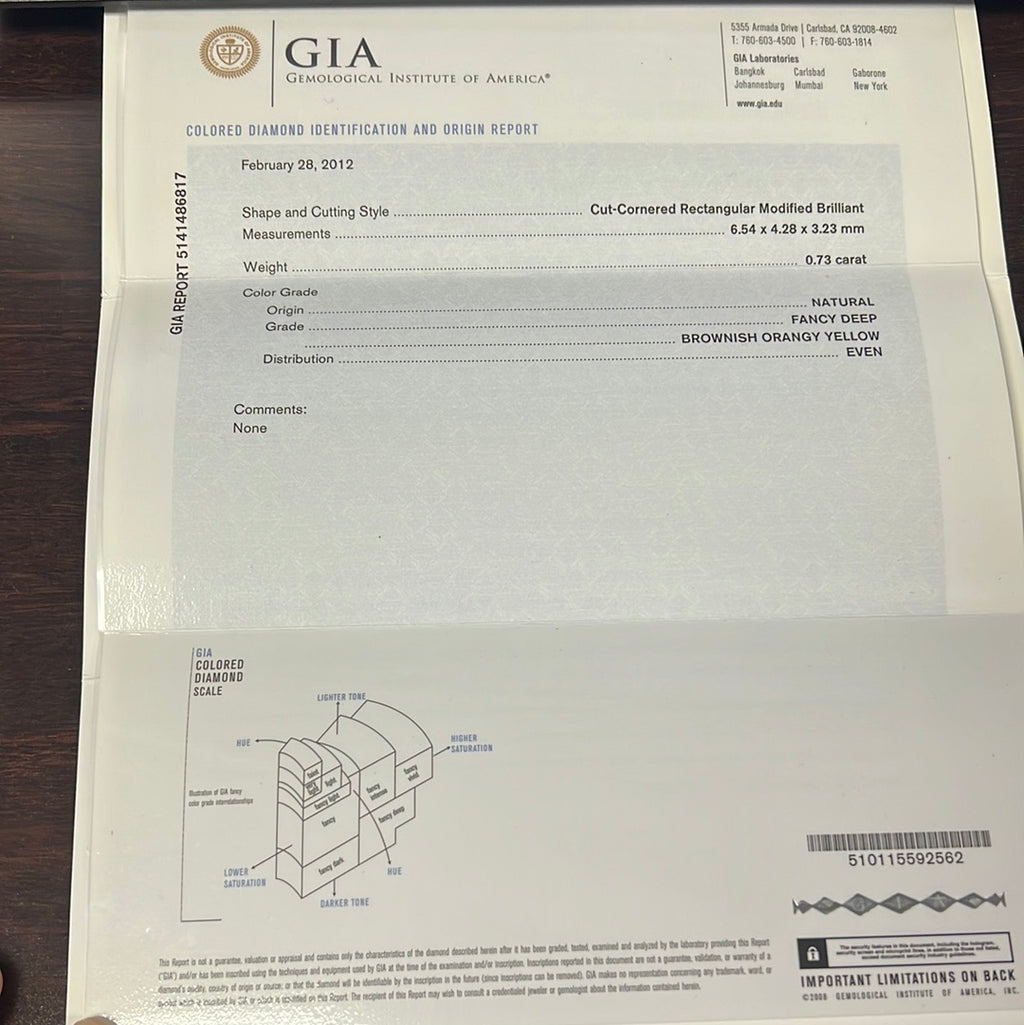 18k White Gold .73ct Fancy Deep Brownish Orangy Yellow Radiant Chocolate  Diamond, .50ct Trillion , .58ct Baguette and .89ct Round F VS2 Diamond Engagement Ring Certified By GIA # 5141486817