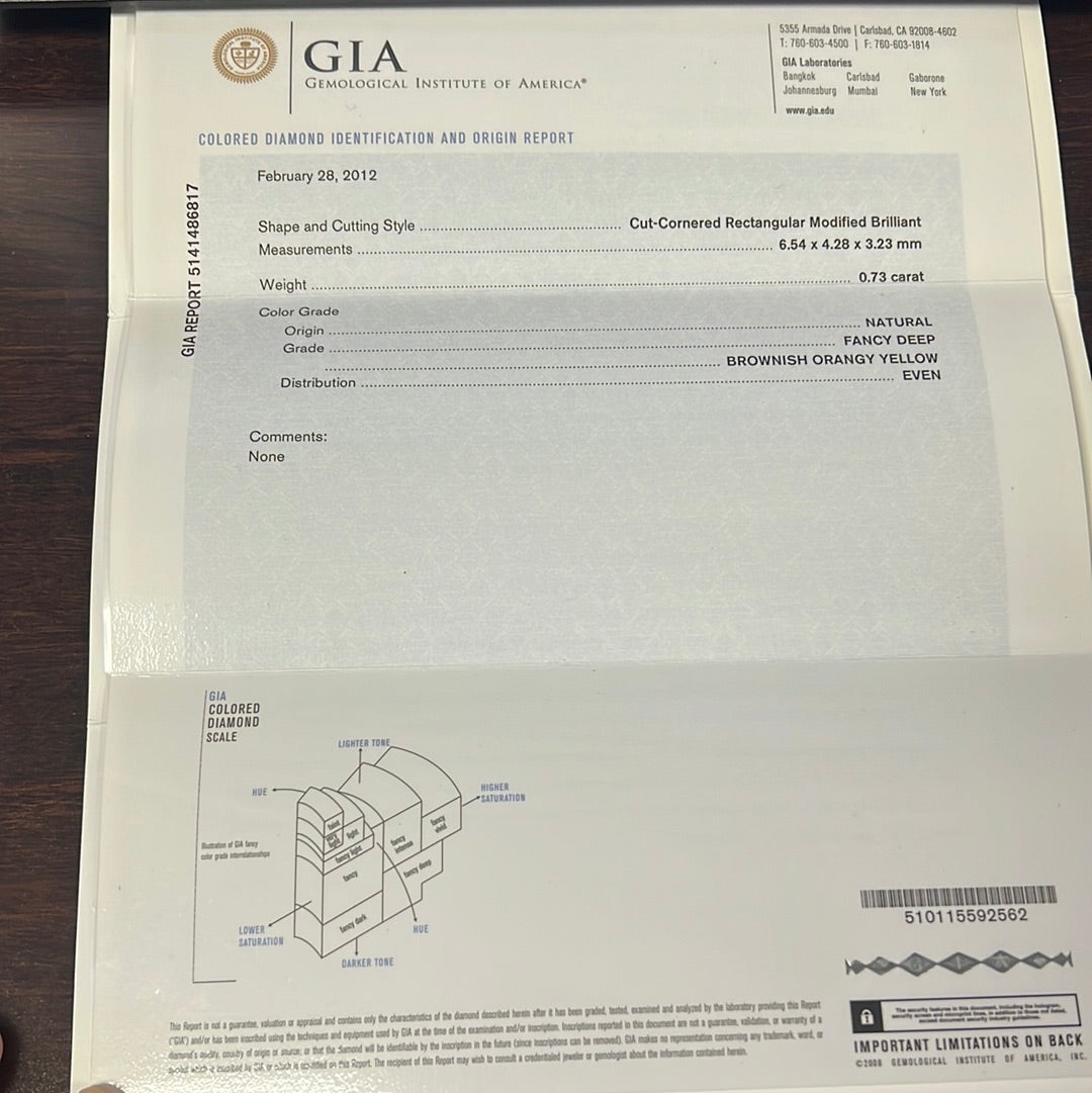 18k White Gold .73ct Fancy Deep Brownish Orangy Yellow Radiant Chocolate  Diamond, .50ct Trillion , .58ct Baguette and .89ct Round F VS2 Diamond Engagement Ring Certified By GIA # 5141486817