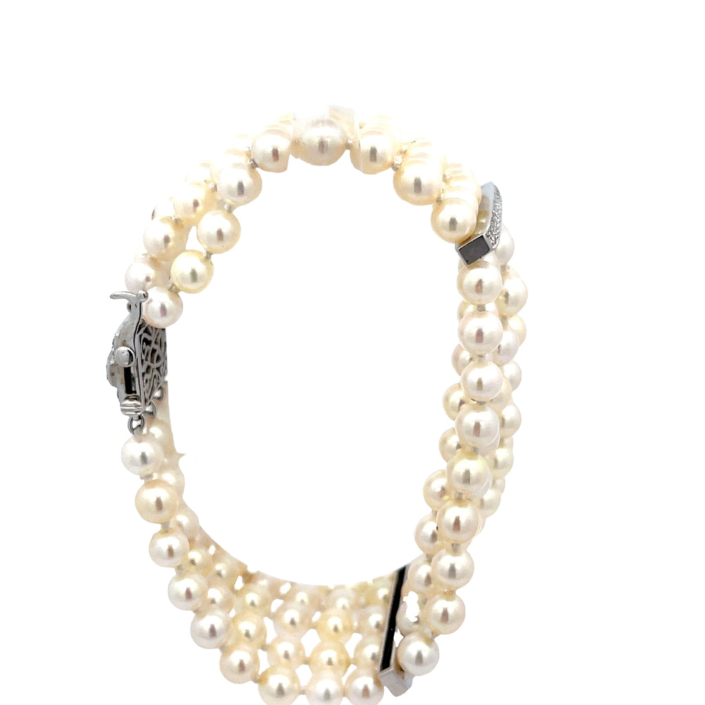 18k White Gold Vintage 2.00ct F VS2 Round and Baguette total weight of Diamonds and Pearl Bracelet
