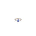14k White Gold .75ct Oval Tanzanite and surround by .34ct F VS2 Round and Baguette Total Weight Diamond  Ring