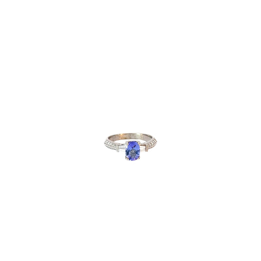 14k White Gold .75ct Oval Tanzanite and Surround by .34ct F VS2 Round and Baguette Total Weight Diamond Ring