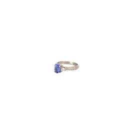 14k White Gold .75ct Oval Tanzanite and surround by .34ct F VS2 Round and Baguette Total Weight Diamond  Ring