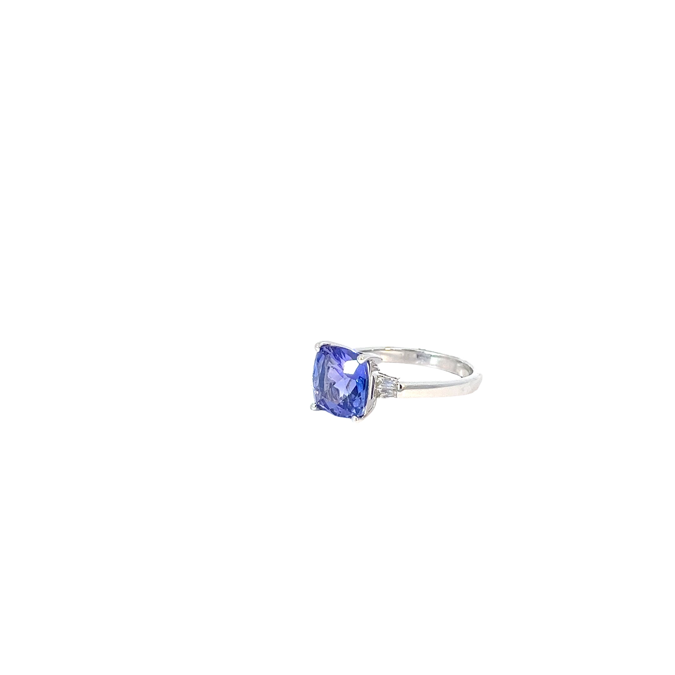 14k White Gold 3.44ct Cushion Shaped Tanzanite and .15ct G VS2 Baguette Diamond Ring