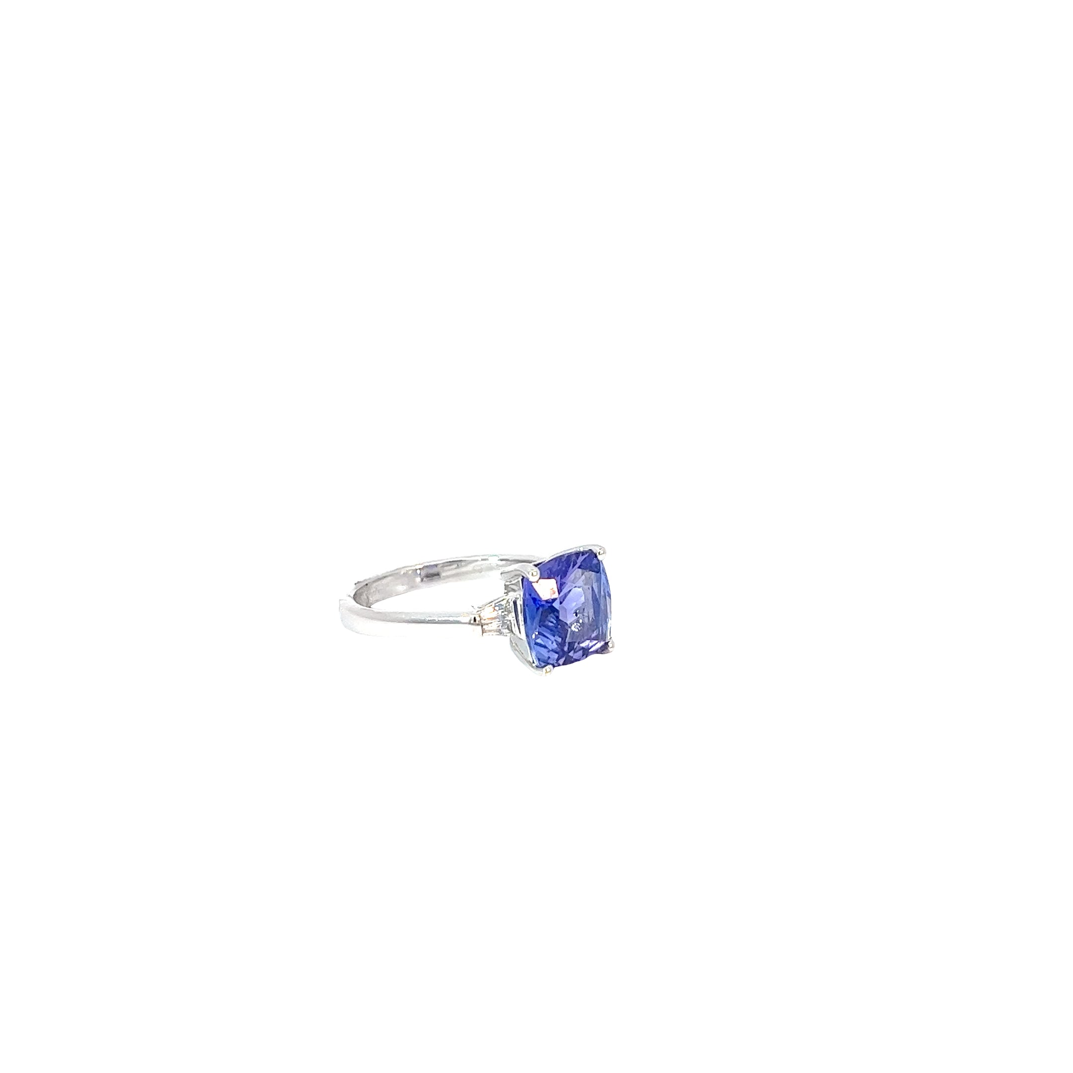 14k White Gold 3.44ct Cushion Shaped Tanzanite and .15ct G VS2 Baguette Diamond Ring