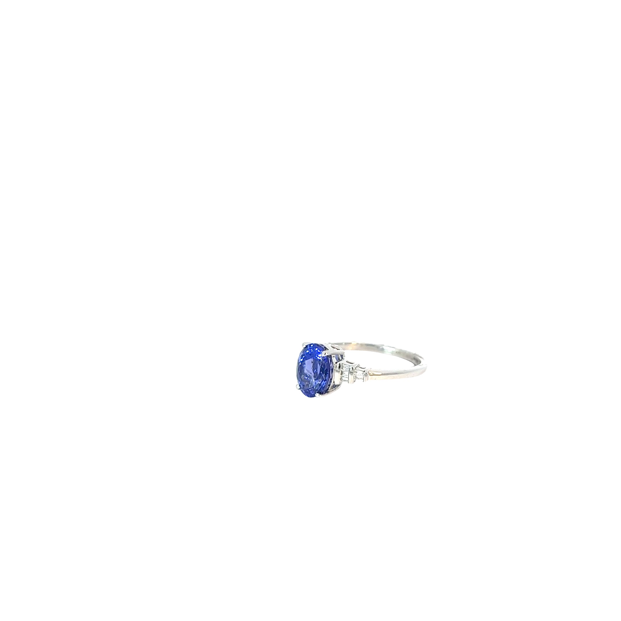 Platinum 1.75ct Oval Tanzanite AAA and .10ct F VS2 Baguette Diamond Ring