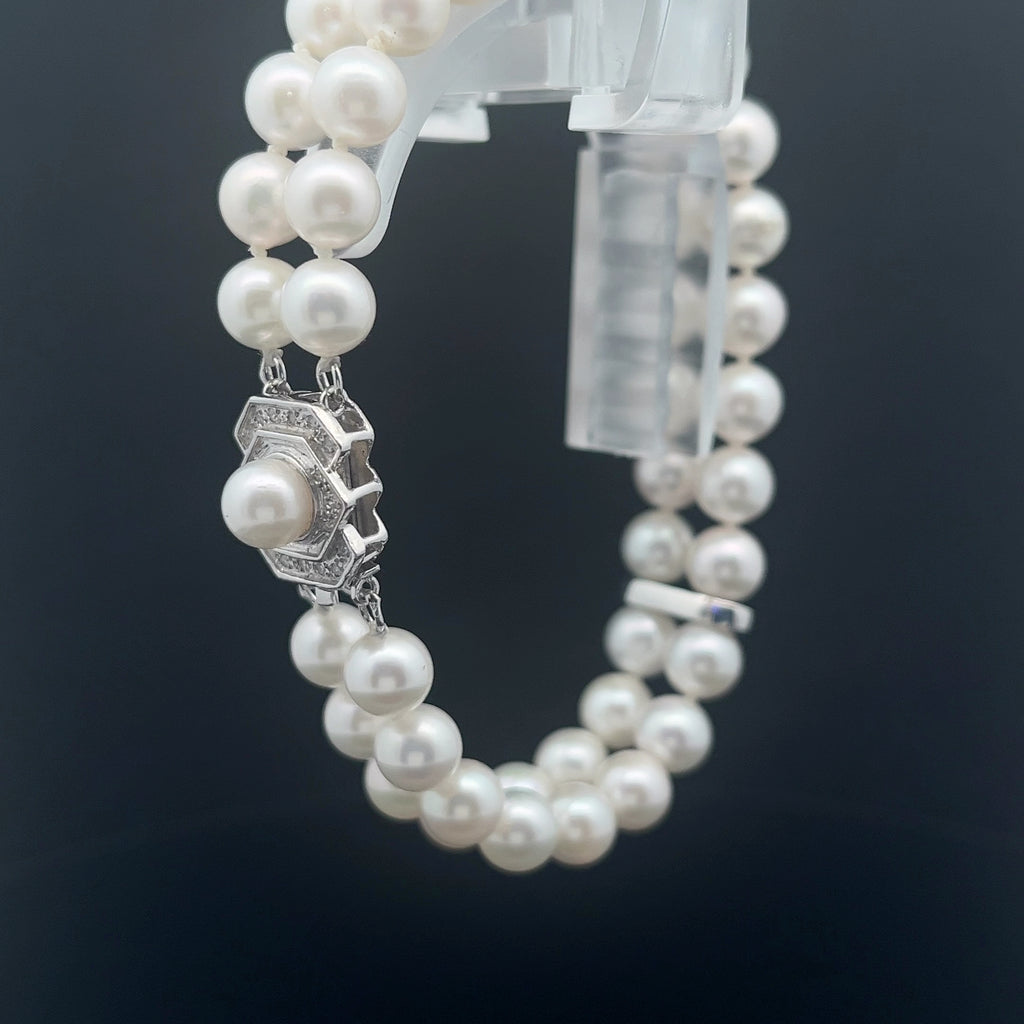 14k white gold double strand Fresh Water White Pearl 7mm and .25ct G SI1 Round Diamond bracelet