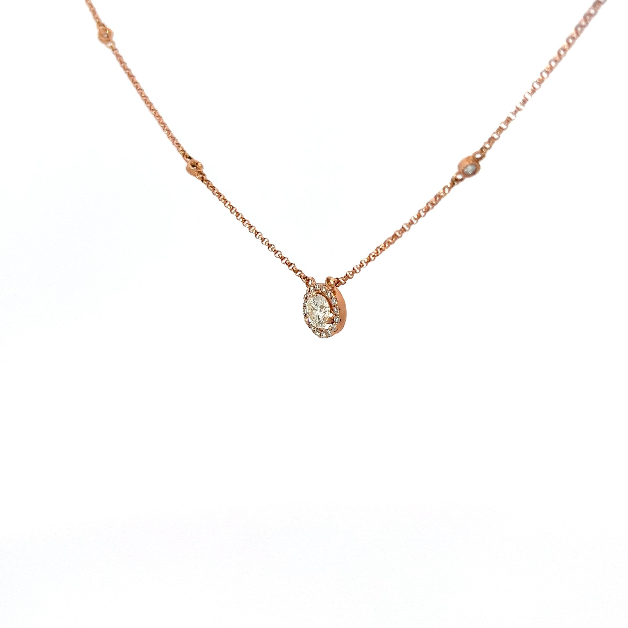 14k Rose Gold .75ct G SI1 Round Diamond Solitaire with Halo Necklace.