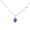 18k White Gold 7.60ct Oval Shape Tanzanite and .75ct G SI1 Round Diamond Necklace