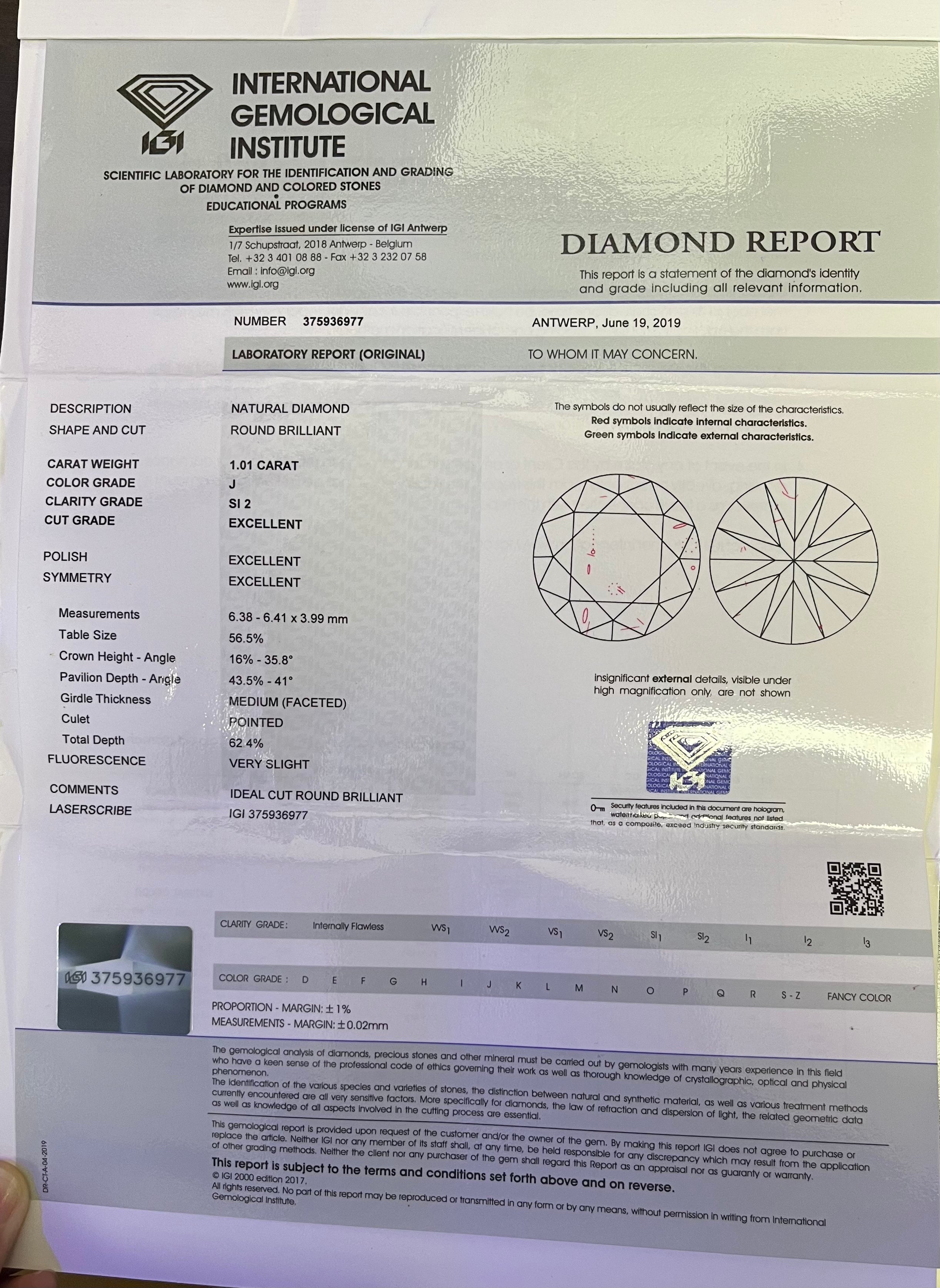 14k Rose Gold 1.01ct  J SI2 Round Diamond Center Stone and .25ct G VS2 Round Diamond along the sides of the engagement Ring. Certified by IGI #375936977