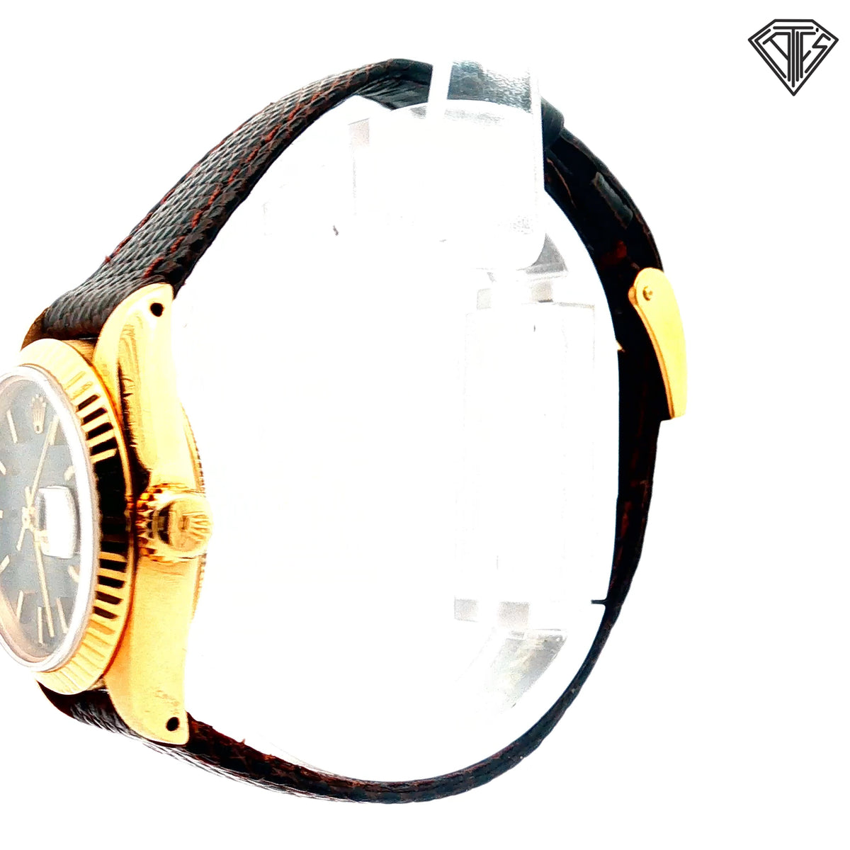 Pre-Owned Vintage Rolex Oyster Perpetual Date Just / 18k Yellow Gold/ Automatic/ 26mm/ Gray Sun Burst Dial/ 18k Yellow Gold Fluted Bezel/ Crystal Acrylic with Cyclops Date Magnifier/ Brown Textured Leather Strap