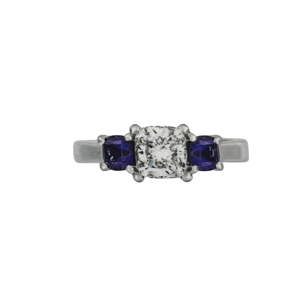 PLATINUM 1.08CT F VS1 CUSHION SET IN A PAST, PRESENT AND FUTURE MOUNTING WITH TWO ROUND LABORATORY GROWN ALEXANDRITES CERTIFIED BY GIA #5234160482 FOR CUSHION  AND GIA #2231160642 FOR ROUND ALEXANDRITES