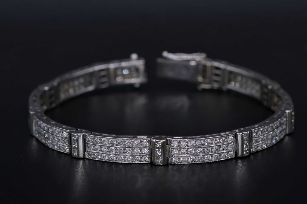Ladies 14k white gold diamond triple row bracelet