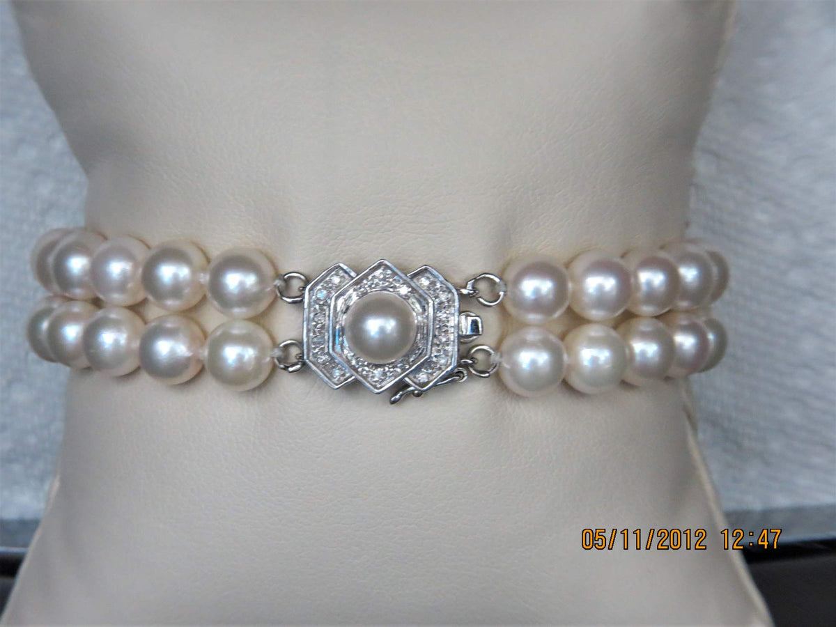 Ladies 14k white gold double strand Pearl and Diamond bracelet