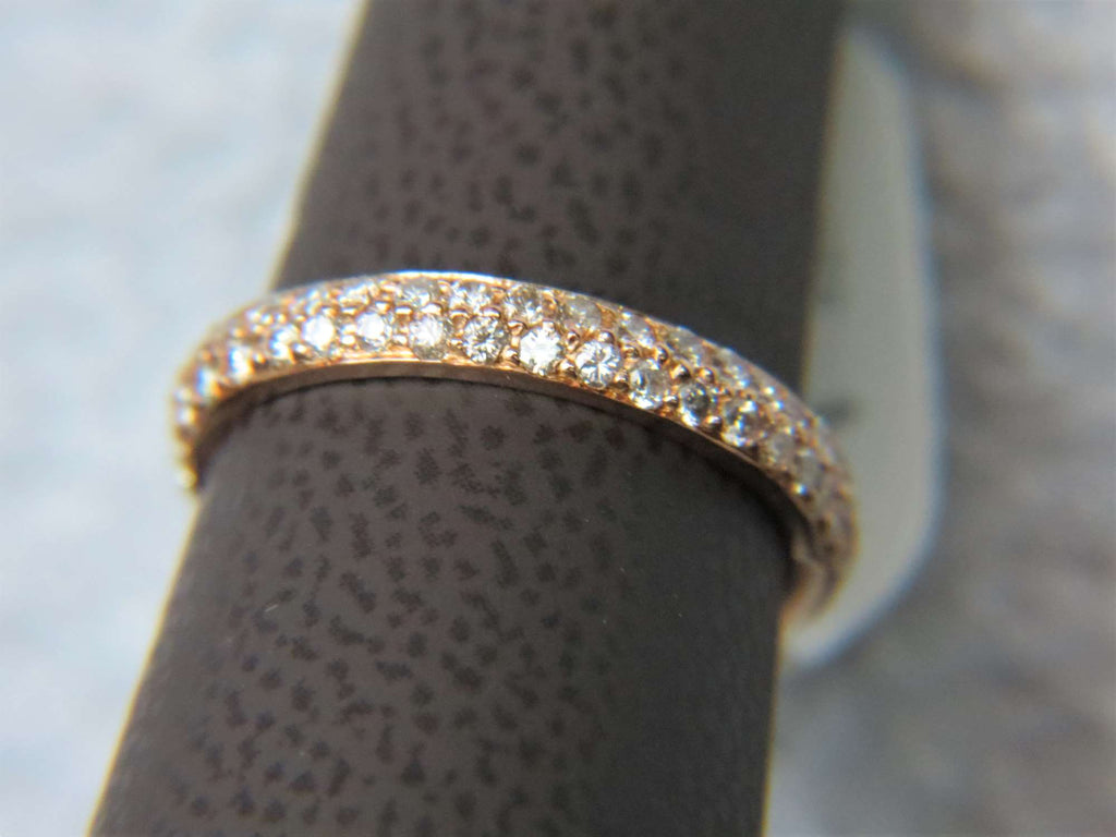 Ladies 18k rose gold pave set diamond eternity ring