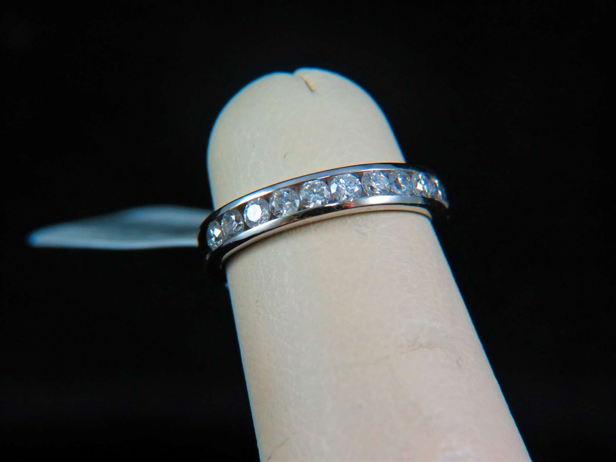Ladies 14k white gold Channel set diamond ring