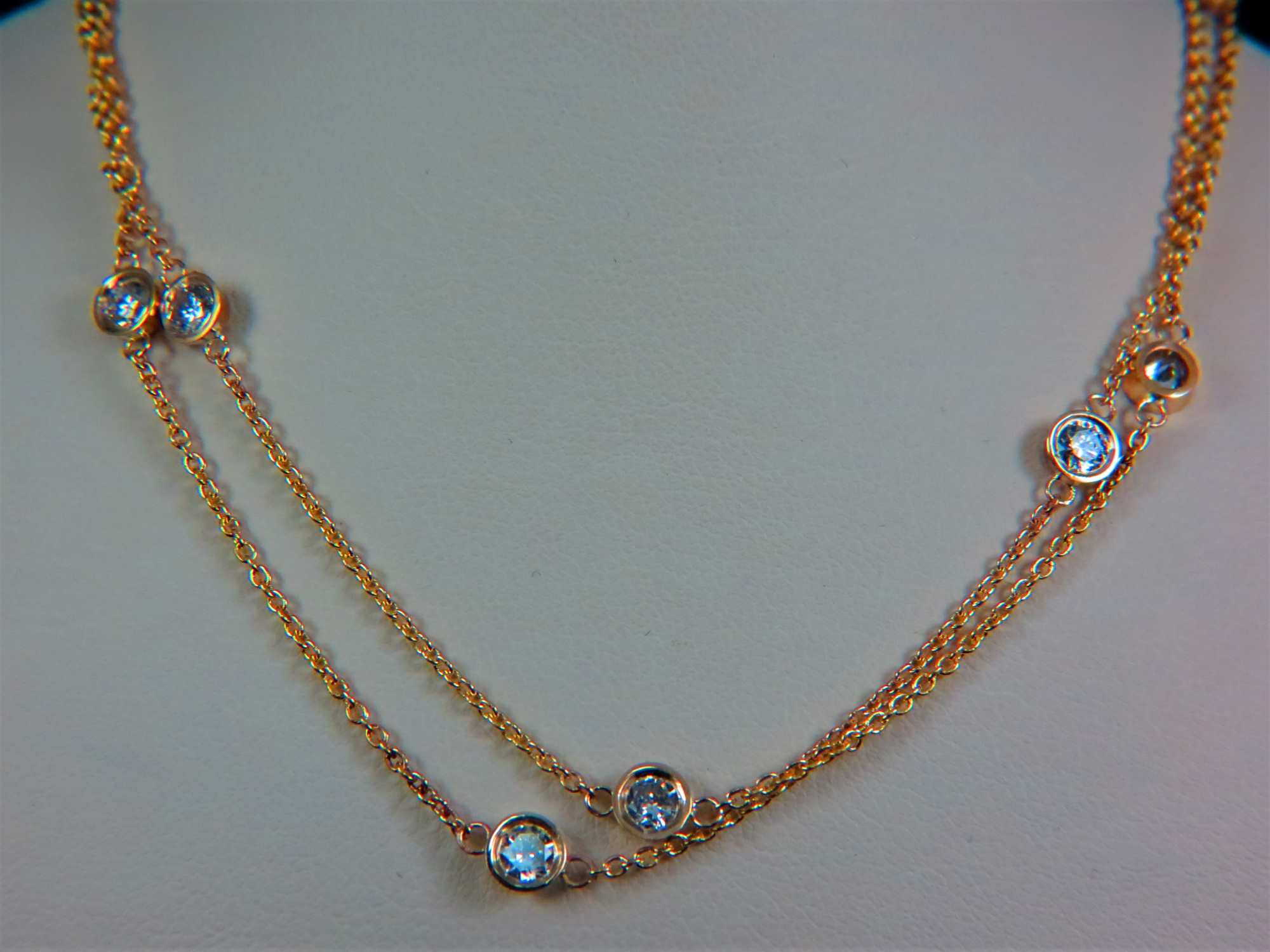Ladies 14k Yellow Gold Diamonds by the yard necklace.