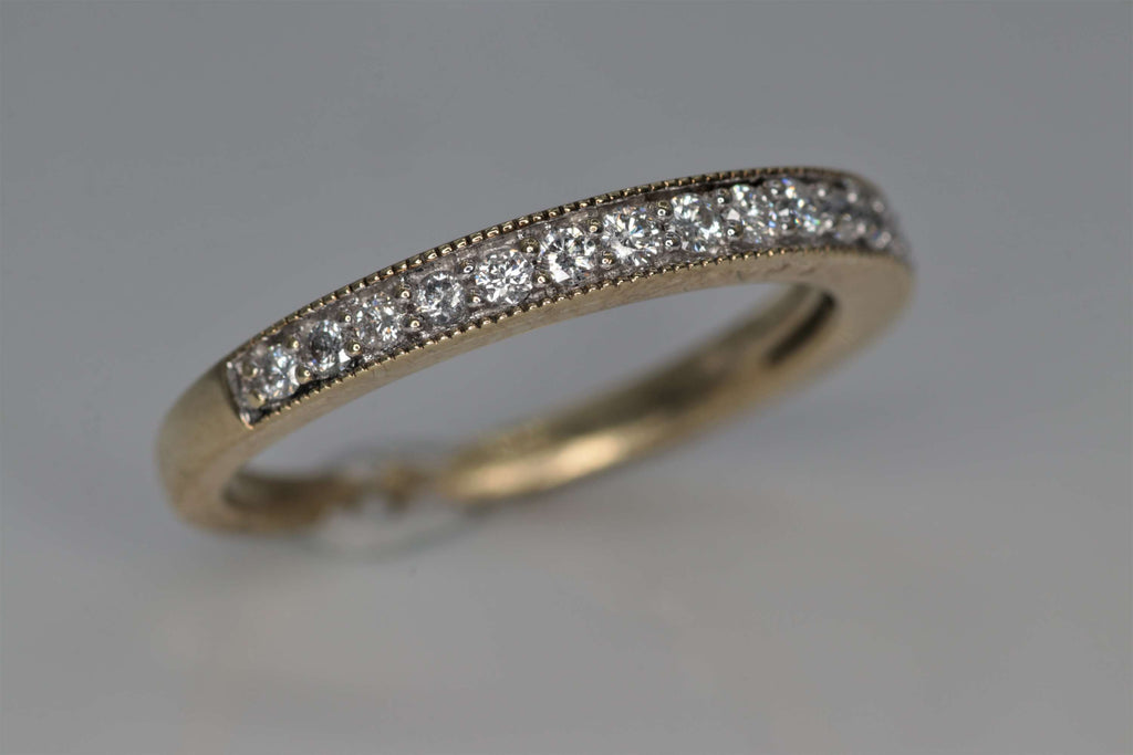 Ladies 14k yellow gold diamond wedding ring